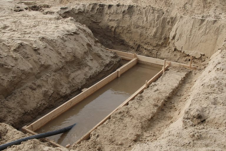 Wet footing trench in dune sand with forms — Concrete Basements in Burns Harbor