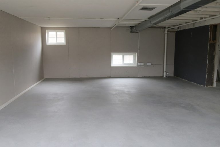 Even gray basement floor, dry and free of stains — Concrete Basements in Dolton