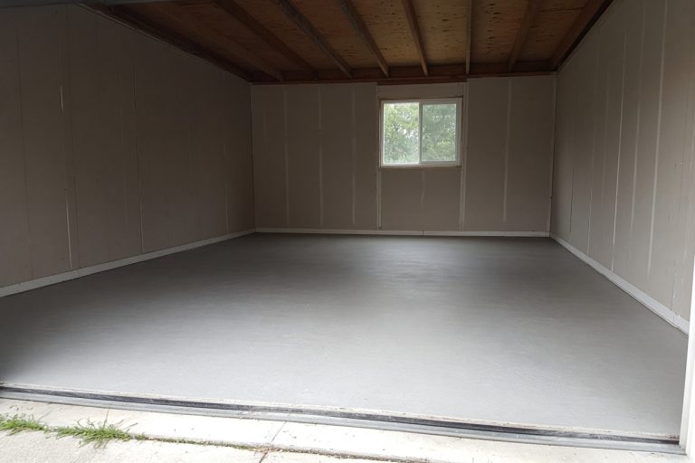 New garage floor finished inside a detached garage - Concrete Demolition Compaines in Valparaiso