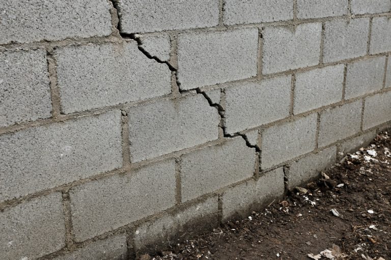 Open stair-step crack in a block foundation wall — Concrete Foundations in Lake Station