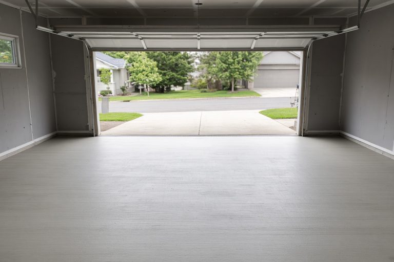 Smooth broom-finish garage slab in daylight — Concrete Garage Floors in Hobart
