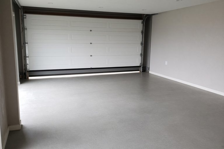 Smooth new garage floor with an even gray finish - Concrete Garage Floors in Lowell