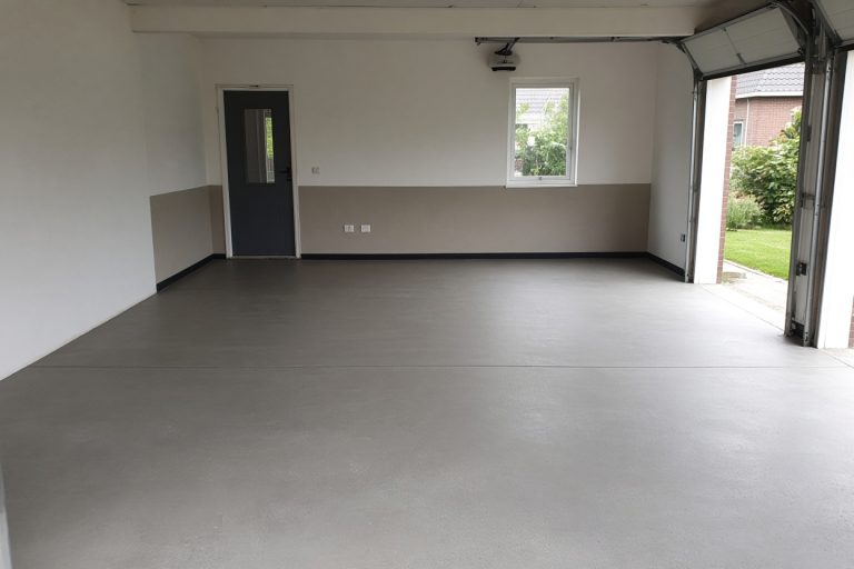 Smooth finished garage floor with even paste and a control joint — Concrete Garage Floors in South Holland