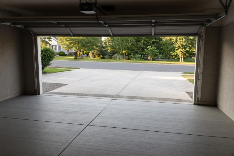 New broom-finished garage slab with the apron in view — Concrete Slabs in Crown Point