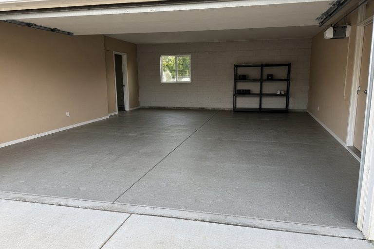Finished garage slab with control joints and a clean apron — Concrete Slabs in Griffith
