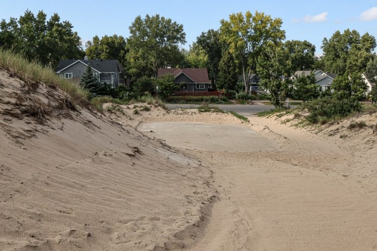 Cleared dune lot with old patio gone - Concrete Removal Companies in Ogden Dunes
