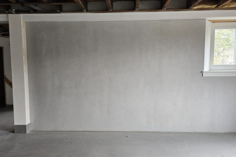 Repaired basement wall with an even concrete surface — Concrete Basements in Portage