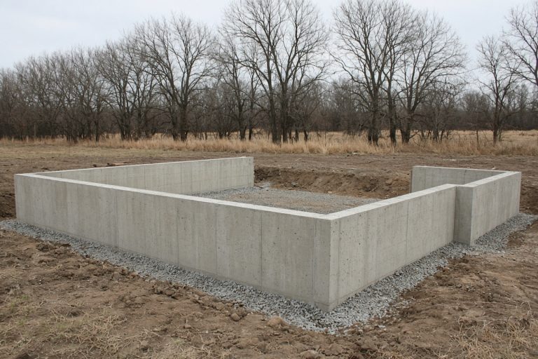 Finished foundation walls with forms stripped on a new house — Concrete Foundations in Wheeler